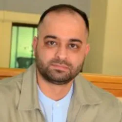 Georgios Vlassis Georgios Vlassis