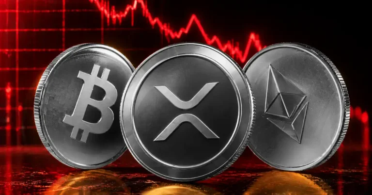 Silver Bitcoin, XRP, and Ethereum coins lined up in front of a glowing red bearish candlestick chart showing a sharp market decline.