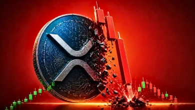 A 3D XRP coin shattering under the pressure of large red bearish candlestick charts against a deep red background, symbolizing a significant price drop.