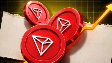 Three 3D red TRON (TRX) coins positioned over a torn paper background with a glowing yellow bullish arrow pointing upward on a grid.