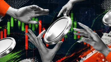 Black-and-white hands reaching for a large silver coin over a dark background with red and green market candlestick charts and paint splashes.