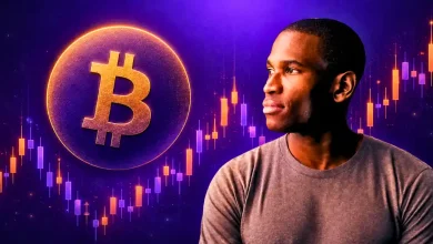 Portrait of Arthur Hayes next to a large gold Bitcoin token.