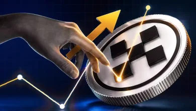 A hand touching a silver OKB token alongside a rising golden trend arrow.