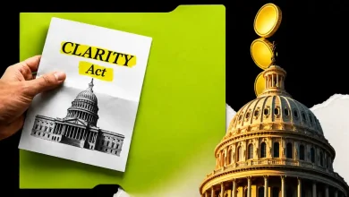A hand holding a CLARITY Act document next to the US Capitol dome and a green folder.
