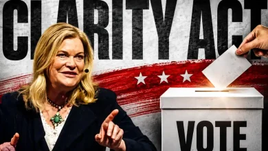 Senator Cynthia Lummis next to a ballot box under a "Clarity Act" sign.