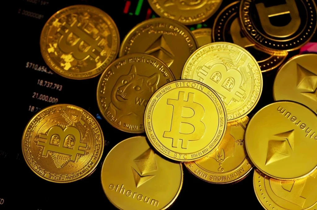 A pile of golden crypto coins