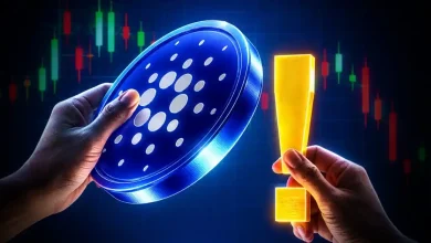 Hands holding a blue Cardano coin and a glowing exclamation mark against a stock chart.