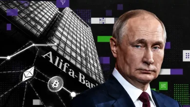 Vladimir Putin pictured next to an Alfa-Bank building showing Bitcoin and Ethereum logos.