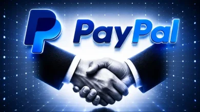 Shaking hands under a blue PayPal logo.