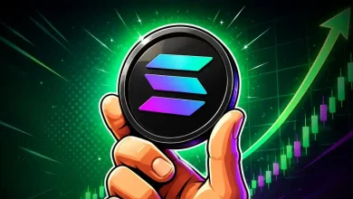 Hand holding Solana coin with rising chart.