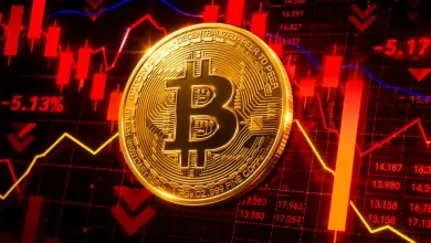 Golden Bitcoin coin on red bearish market chart.