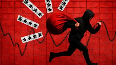 Hooded figure running with a red loot bag past password icons.