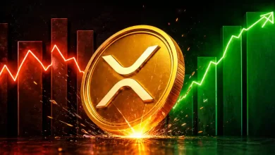 Gold XRP coin between red falling and green rising chart lines.