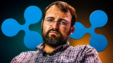 Portrait of Charles Hoskinson in front of blue Ripple XRP logos.
