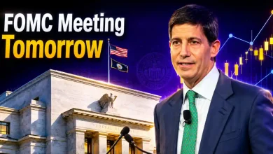 Man in a suit with the Federal Reserve building and stock chart behind him.