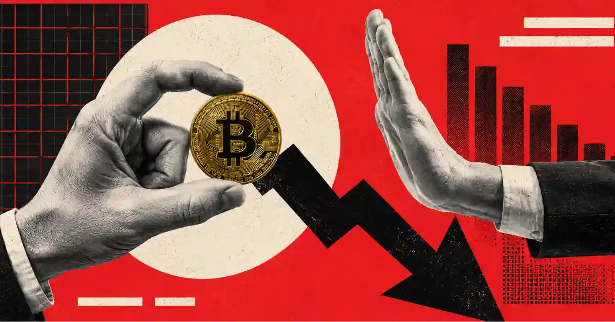 Hand holding a Bitcoin next to another hand gesturing stop before a down arrow.