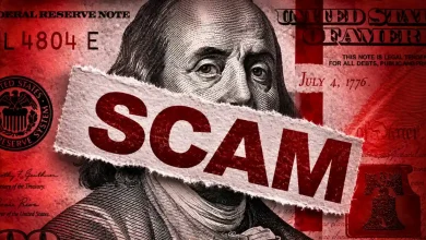 Red US dollar bill overlaid with torn paper reading SCAM.