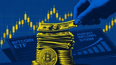 Hand placing cash onto Bitcoin coins in front of Bitcoin ETF screen.