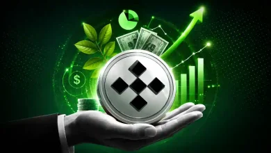 Hand holding OKB coin in front of green rising growth chart.