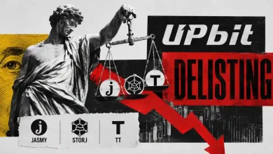 Classical statue holding scales with Jasmy, Storj, and TT logos beside Upbit delisting text and falling arrow.