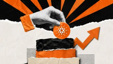 Hand placing Cardano ADA coin on growth stack next to upward arrow.