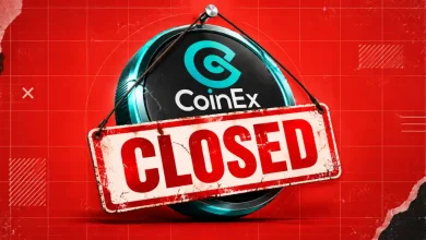 CoinEx logo coin hanging with a rustic CLOSED sign attached.