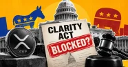 CLARITY Act document with BLOCKED stamp, XRP coin, and US Capitol.