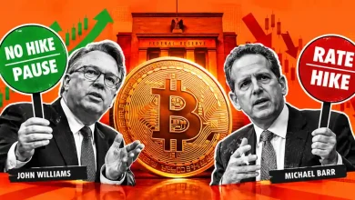 John Williams and Michael Barr with Bitcoin coin and Fed rate signs