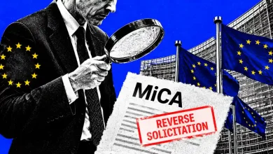 Person with magnifying glass inspecting MiCA reverse solicitation document