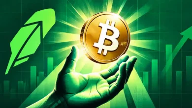 Hand holding glowing Bitcoin coin next to Robinhood logo and rising green chart