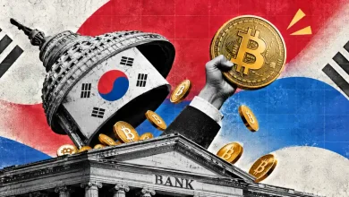 Hand raising a giant Bitcoin coin above a traditional bank with South Korean flag
