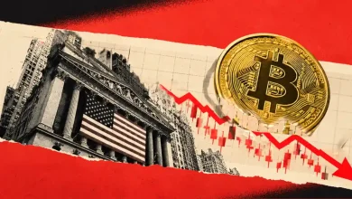 Gold Bitcoin coin beside falling red chart arrow and US stock exchange building
