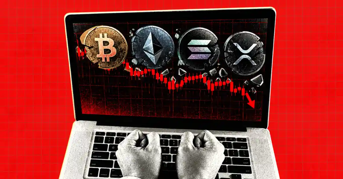Cracked Bitcoin, Ethereum, Solana, and XRP coins on a laptop with a falling chart
